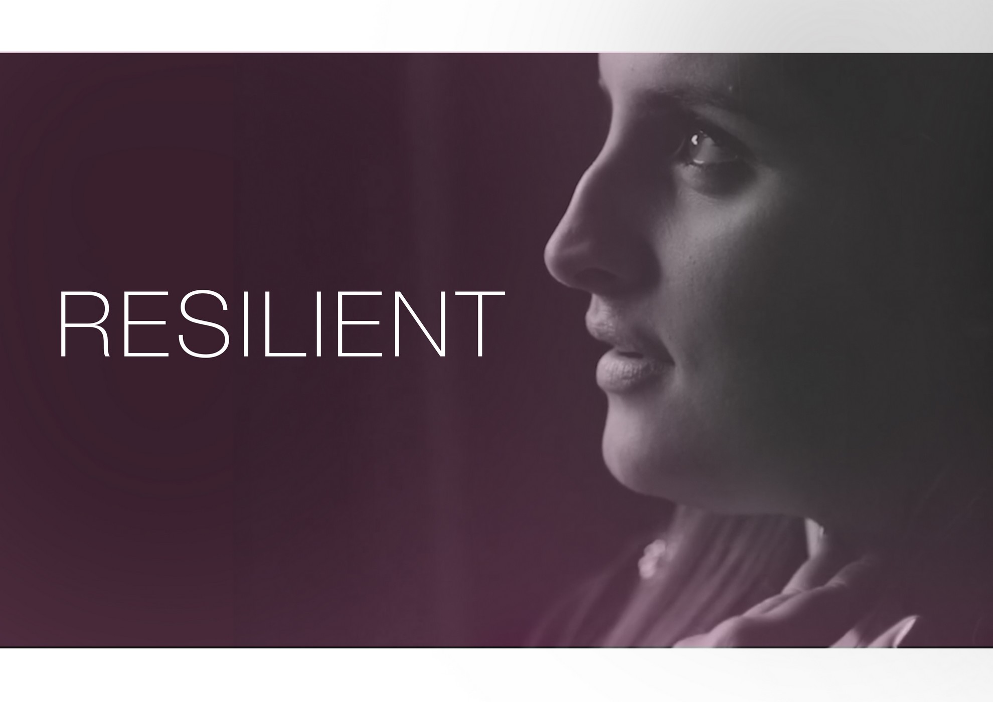 koko blog RESILIENT cover, young woman speaking to someone off camera - black and white image