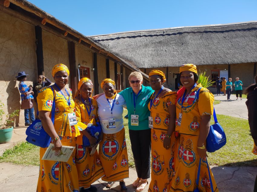 Girls' Brigade England and Wales volunteer with international Girls' Brigade members