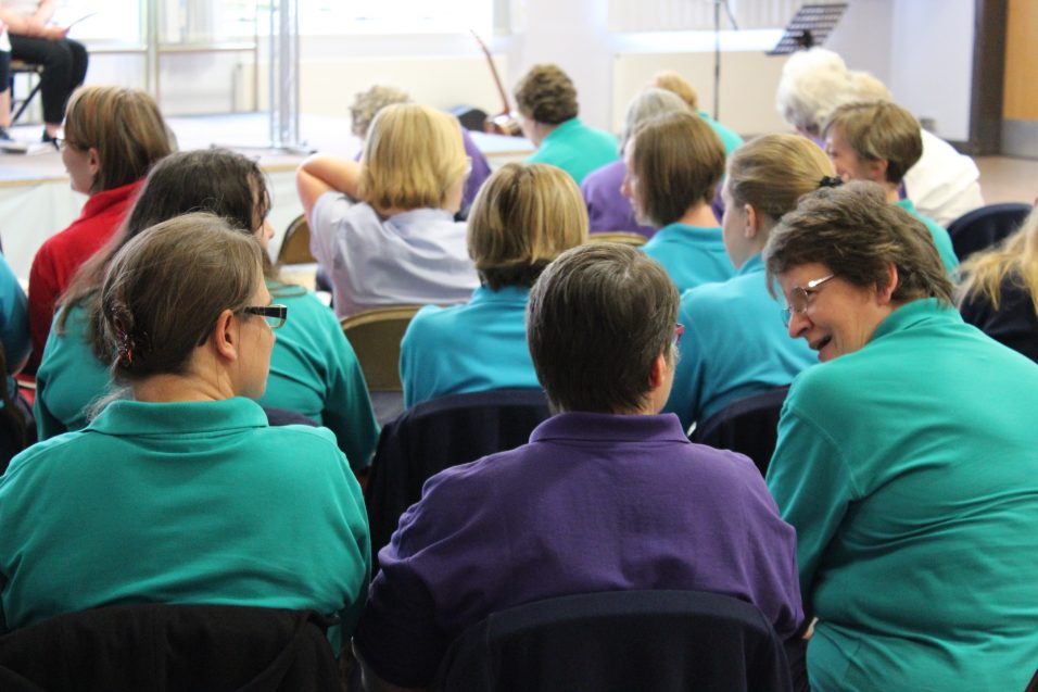 Girls' Brigade volunteers chatting at conference