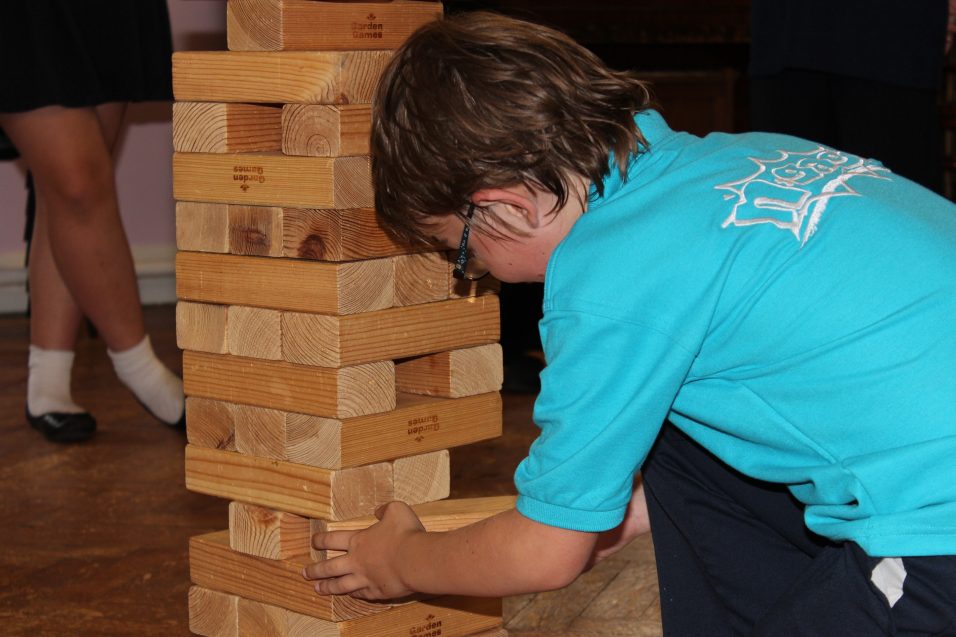 n:gage boy playing Jenga game