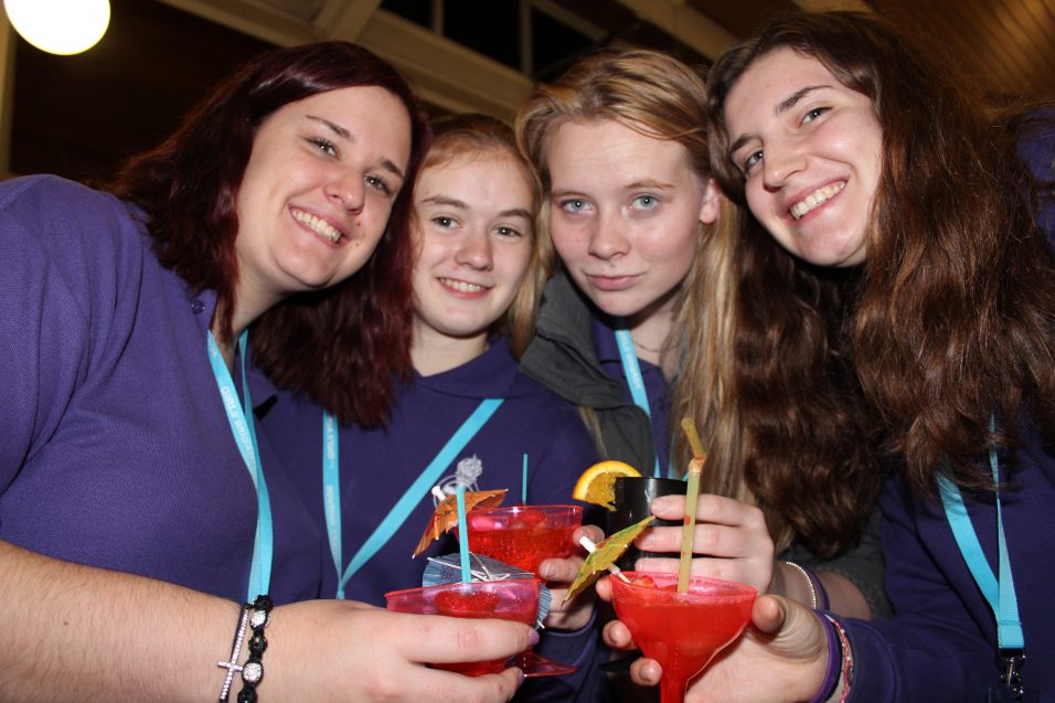 four n:spire girls toasting with mocktails