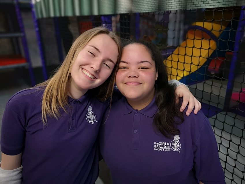 n:spire girls with an arm around each other at soft play area