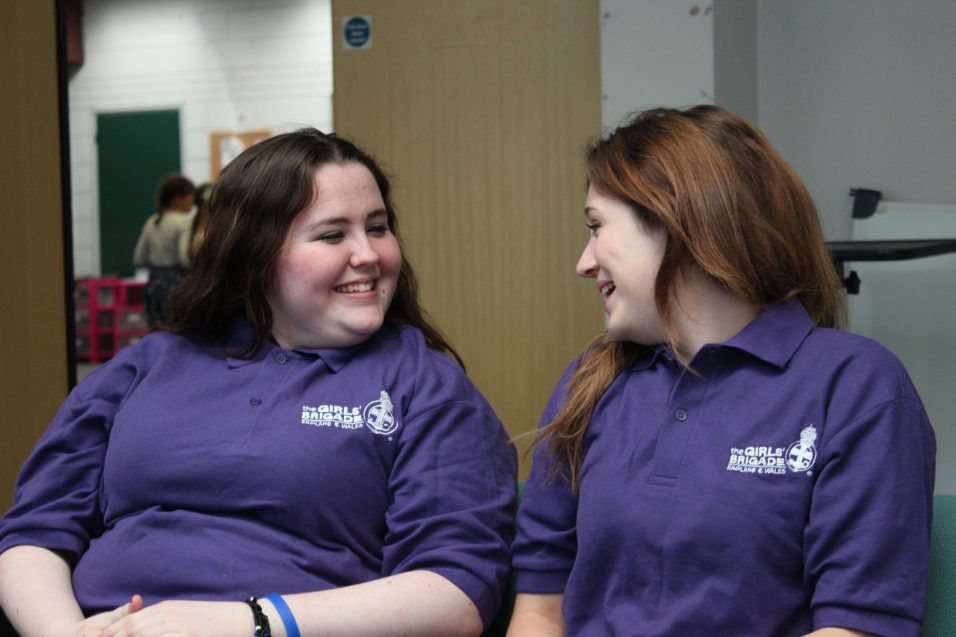 n:spire girls smiling and laughing together