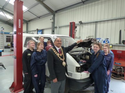 young women from 35th birmingham girls brigade group with the van they are renovating and the mayor