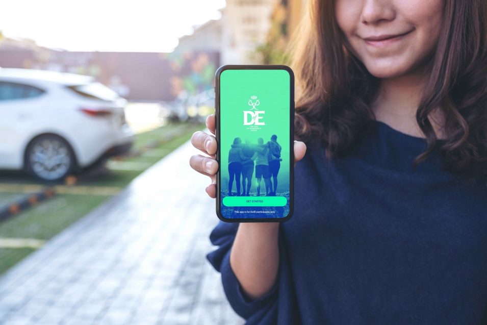 young person on phone with dofe app