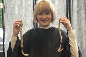 GB member holding donated hair