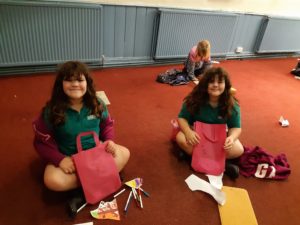 Two girls with goodie bags