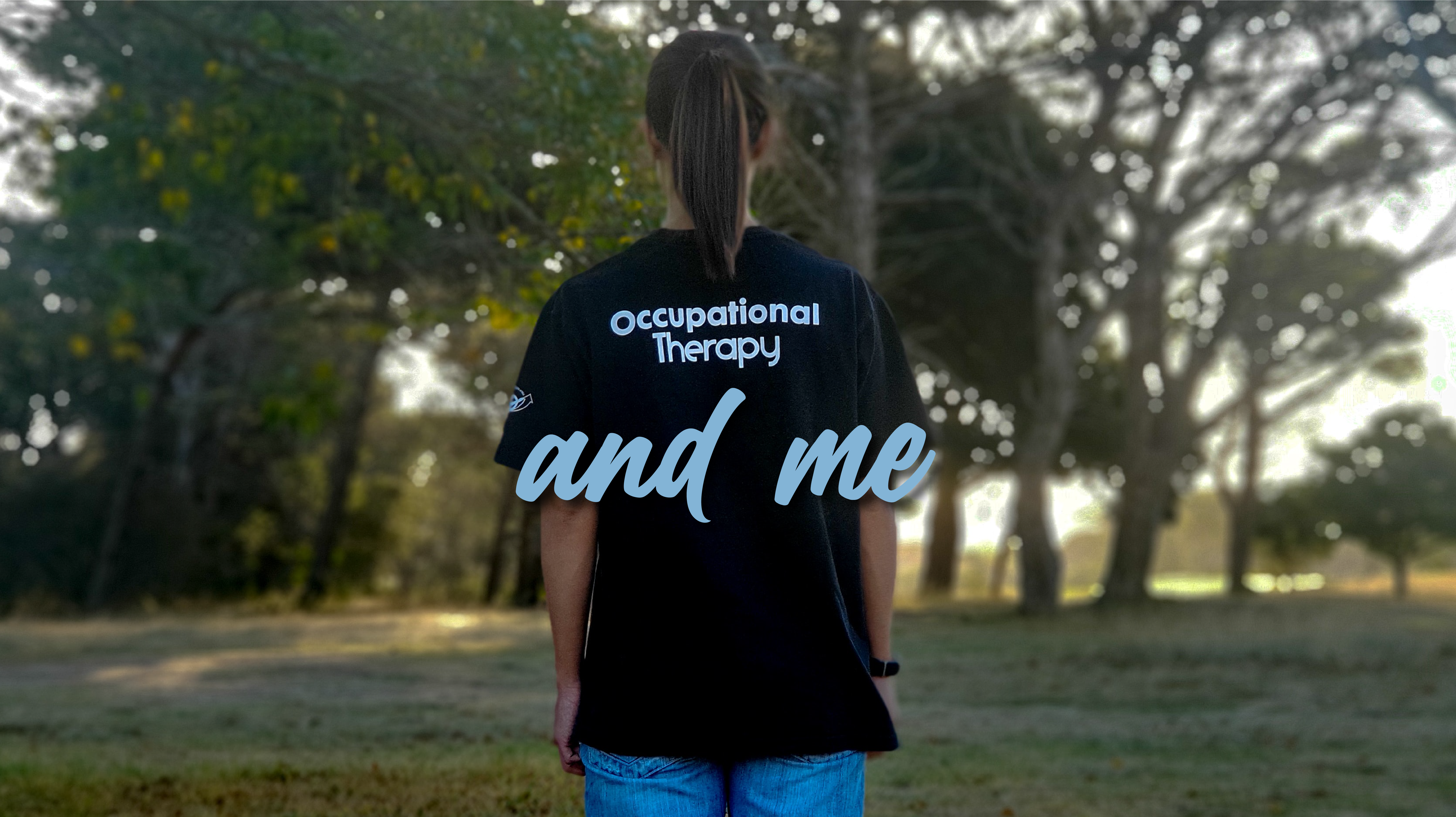 Young woman wearing t-shirt with 'occupational therapy' written on the back