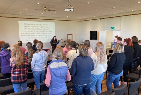 Young leaders taking part in singing worship