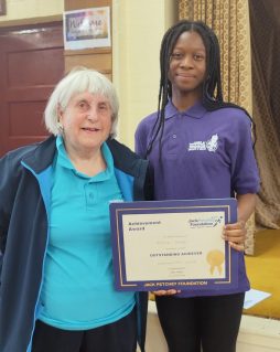 n:spire member holding Jack Petchey Award certificate