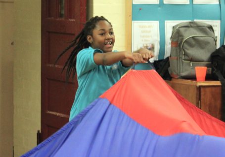 n:gage member holding parachute handle