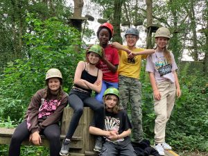 1st Kings Hill GB group members wearing hard hats on their activity camp